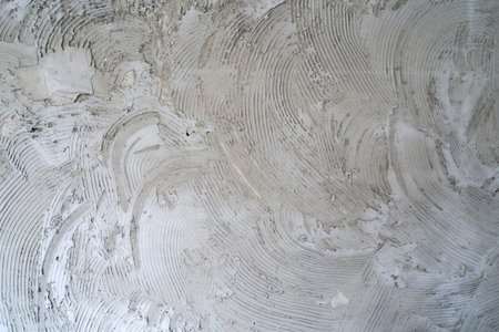 concrete wall comb surface prepared for tiling