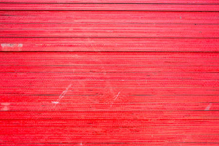 red plywood stack texture backgroundの写真素材