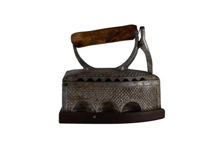 old vintage antique iron with wooden handle isolated on white background