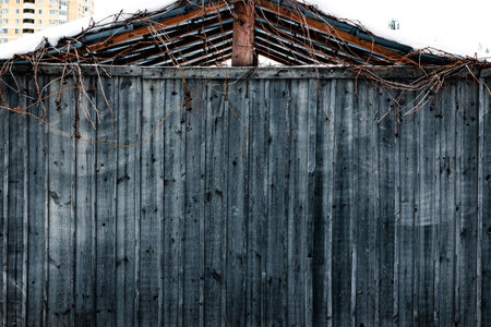 wood old weathered textured rustic fence vertical plank wall with knotsの写真素材