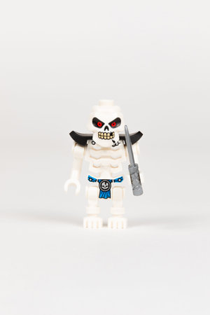 Yekaterinburg. Russia. 04.08.2021. Toy hero skeleton ice general Wyplash with a dagger from a set of lego ninjago on a white background. close-up. selective focusのeditorial素材