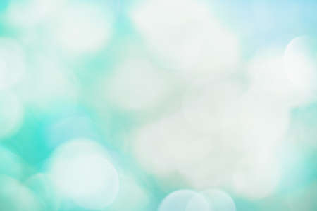 Green nature sunlight colorful bokeh abstract background .Vintage pastel color tone style.の写真素材