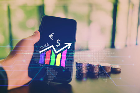 Woman hand using smartphone or tablet to do business, financial or trading stock forex market  with...