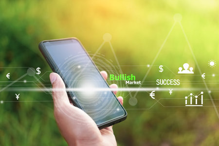 Woman hand using smartphone or tablet to do business, financial or trading stock forex market