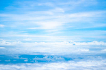 Copy space of airplane view above cloud summer blue sky and sun light abstract nature background.の写真素材