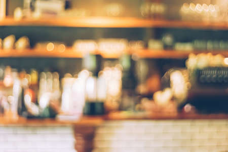 Blur coffee and restutant cafe with customers background vintage tone color style.の写真素材
