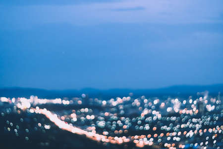 Blur colorful bokeh light in night city view abstract background.の写真素材