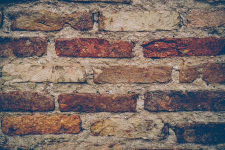 Old brick wall background.Vintage color tone style.の写真素材