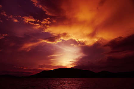 Magenta color of sunset twilight sky and cloud background.の写真素材