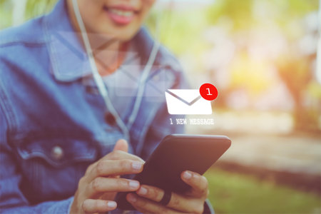 Woman hand using smartphone got 1 new message email. Business communication  technology concept.