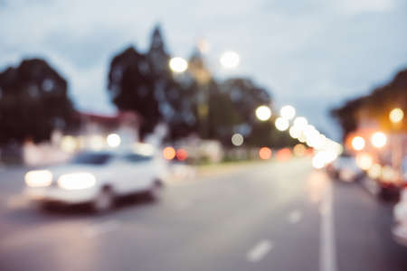 Blur traffic road with cars and other vehicle with bokeh light background.の写真素材