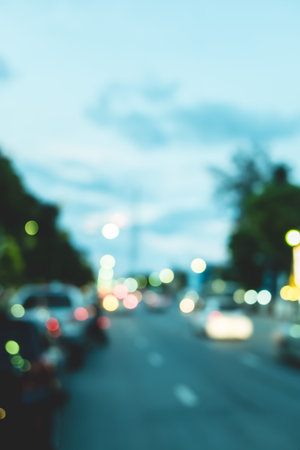 Blur traffic road with cars and other vehicle with bokeh light background.の写真素材