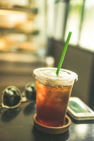 Black coffee or Americano on table with film vintage tone background.の写真素材