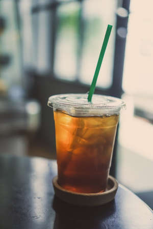 Black coffee or Americano on table with film vintage tone background.の写真素材