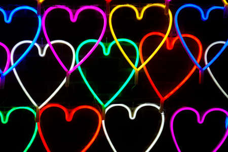 Heart light shape sparkle at night background.の写真素材