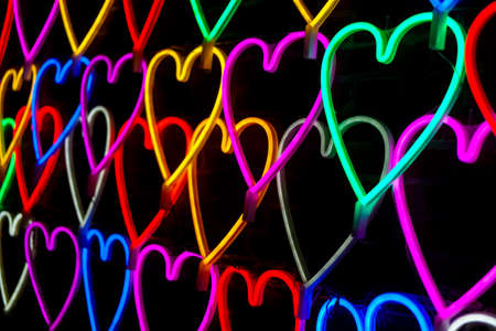 Heart light shape sparkle at night background.の写真素材