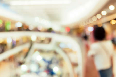 Blur people shopping mall center department store in weekend background.の写真素材