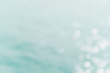 Blur beach with bokeh blue color background.の写真素材