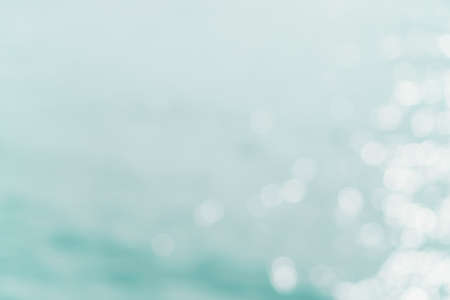 Blur beach with bokeh blue color background.の写真素材
