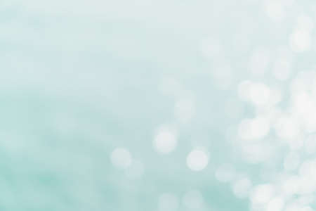 Blur beach with bokeh blue color background.の写真素材