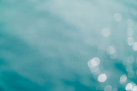 Blur beach with bokeh blue color background.の写真素材