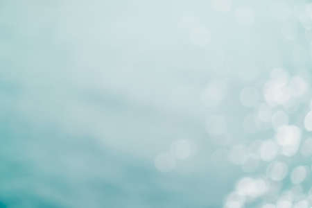 Blur beach with bokeh blue color background.の写真素材