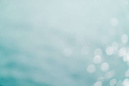 Blur beach with bokeh blue color background.の写真素材