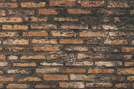 Old grunge orange brick background texture.の写真素材
