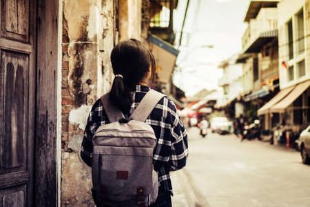 Woman travel around the world with backpack freedom and relax life concept.の写真素材