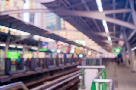 Blur capital town many buildings in city with transportation system double exposure graph and technology icon  with sunlight background.の写真素材