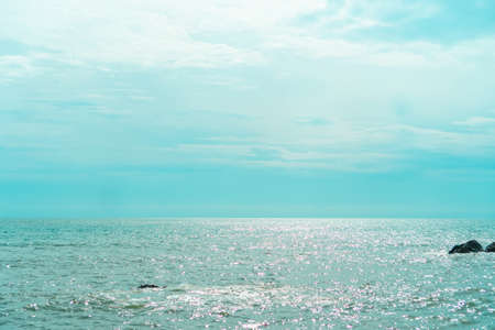 Beach with island sun light and blue sky background.の写真素材