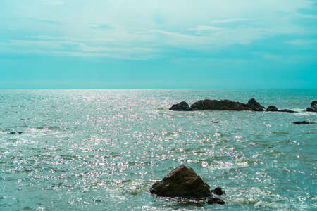 Beach with island sun light and blue sky background.の写真素材