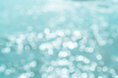 Blur beach with bokeh blue color background.の写真素材