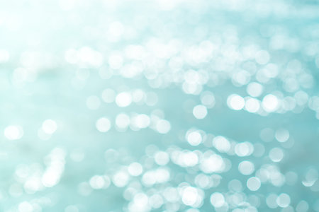 Blur beach with bokeh blue color background.