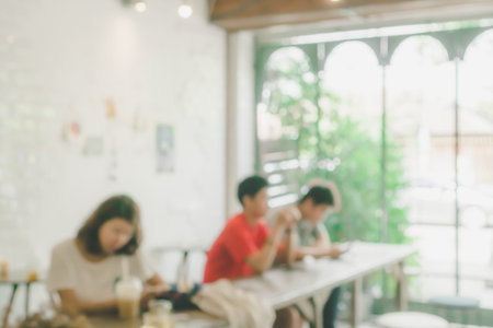 Blur coffee and restutant cafe with customers background vintage tone color style.