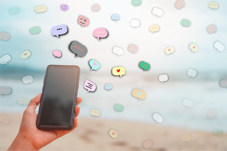 Woman hand using smartphone with chat icon background. Business communication social network...