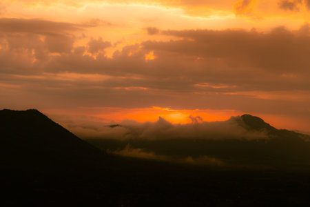 Beautiful sunrise with cloud and mountain view in morning.