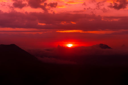 Beautiful sunrise with cloud and mountain view in morning.