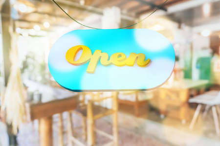 Welcome open sign use for any business in front of shop or online background.の写真素材