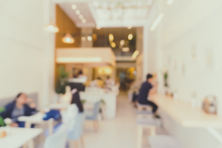 Blur coffee and restutant cafe with customers background vintage tone color style.
