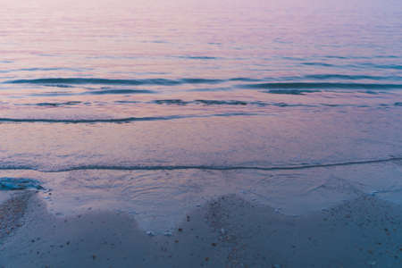 Tropical nature clean beach and white sand in summer with sun light blue sky and bokeh abstract  background.の写真素材