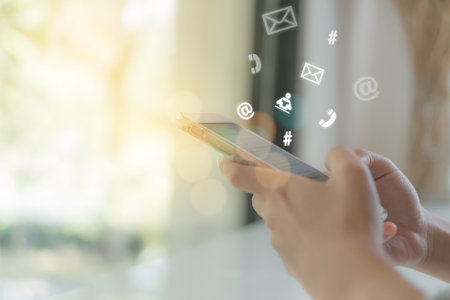 Communication fintech sign icon and connection screen of smartphone with blur cafe coffee shop...