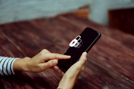 Lock sign security system icon screen on smartphone show feel safe in social network or mobile banking.の写真素材