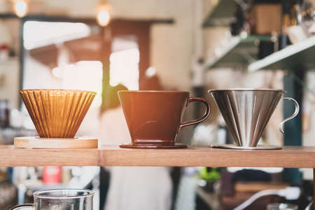 Closed up of dripper for make coffee manualy with sunlight background.の写真素材