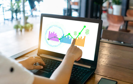 Fintech financial icon and market stock graph pop up in computer screen monitor with finger point....