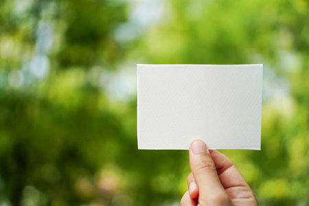 Copy space of white paper on nature background. Use for put text on blank space.の写真素材