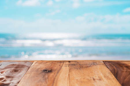 Selective focus of old wood table with blue sky background for display your product.の写真素材