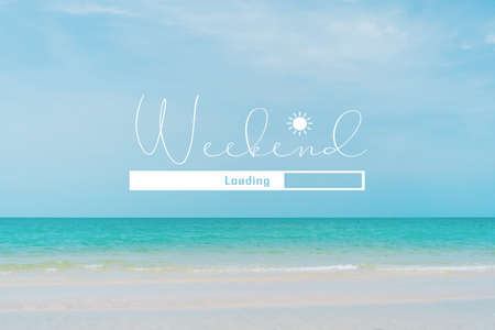 Weekend loading qoute on nature blue sky summer tropical beach. Travel tourism season concept background.の写真素材