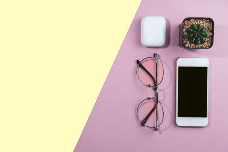 Flat lay, top view office table desk. Workspace with blank copy space supplies decorate as frame on white or color pastel background.の写真素材