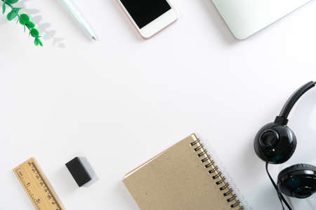 Flat lay, top view office table desk. Workspace with blank copy space supplies decorate as frame on white or color pastel background.の写真素材